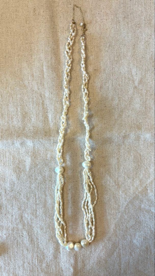 Agete freshwater pearl necklace made of K10 gold with a 60 cm length displayed on a white background