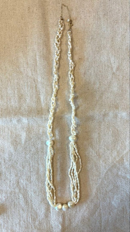 Agete freshwater pearl necklace made of K10 gold with a 60 cm length displayed on a white background