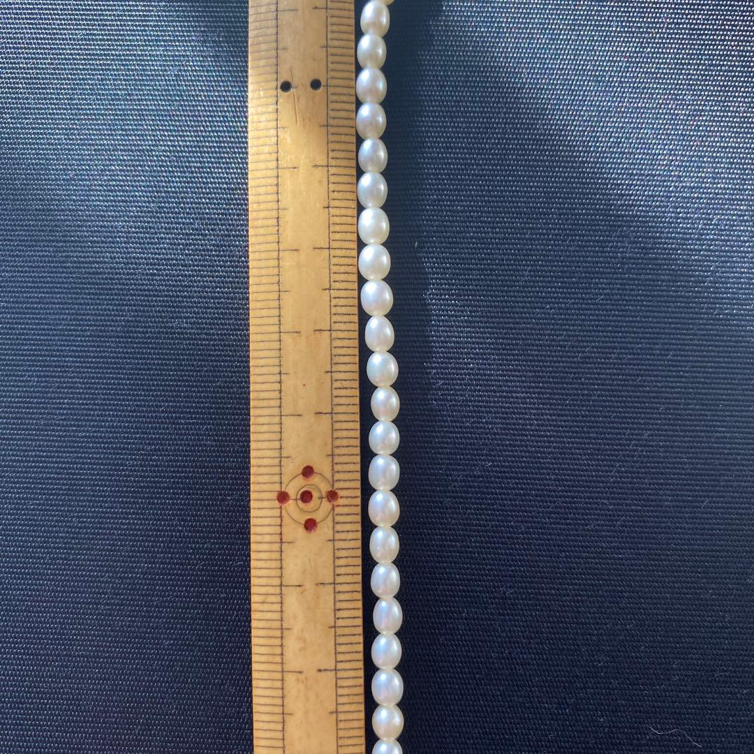 Tasaki K18 Pearl Necklace about 62 cm long featuring lustrous pearls on fine gold chain