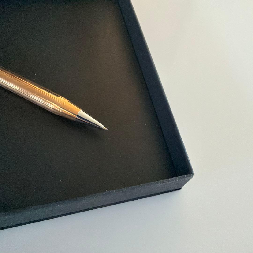Cross brand 0.5mm gold color mechanical pencil shown on white background