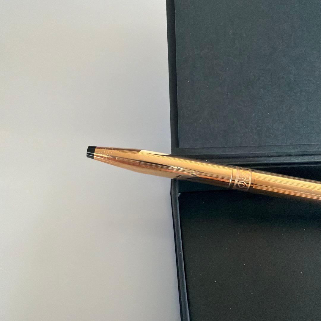Cross brand 0.5mm gold color mechanical pencil shown on white background