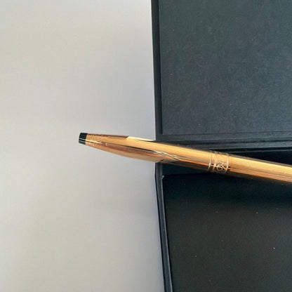 Cross brand 0.5mm gold color mechanical pencil shown on white background