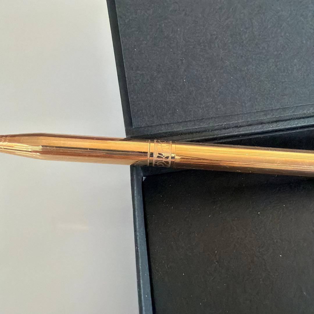 Cross brand 0.5mm gold color mechanical pencil shown on white background