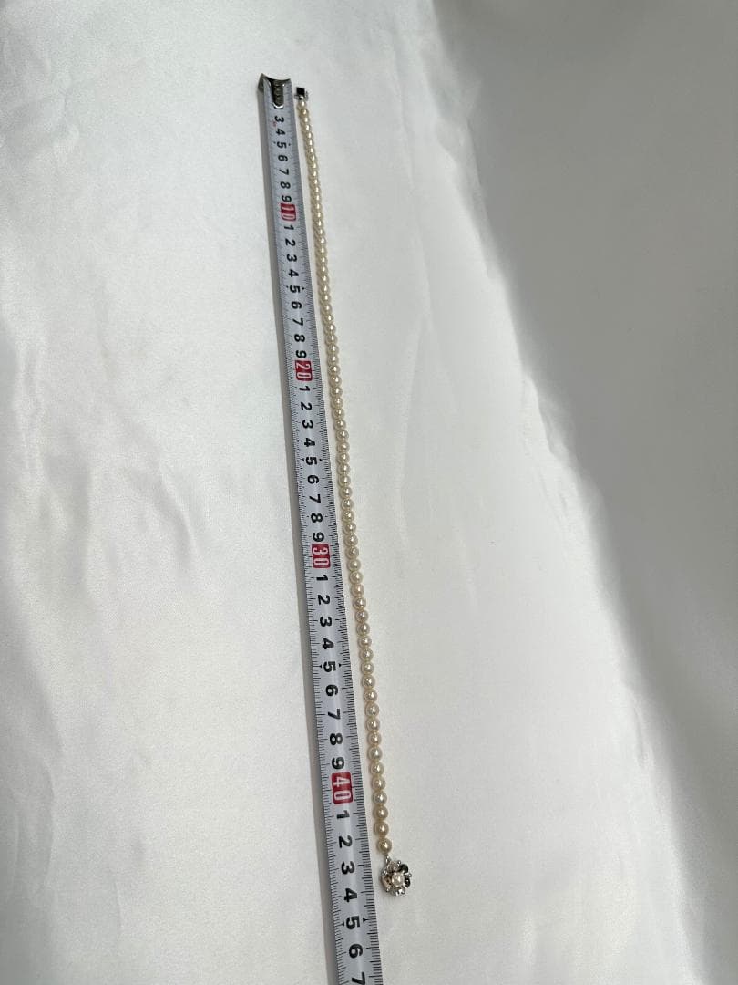Akoya genuine pearl necklace with 6.2mm pearls and silver engraved clasp with safety feature