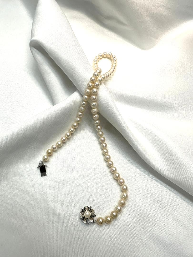 Akoya genuine pearl necklace with 6.2mm pearls and silver engraved clasp with safety feature