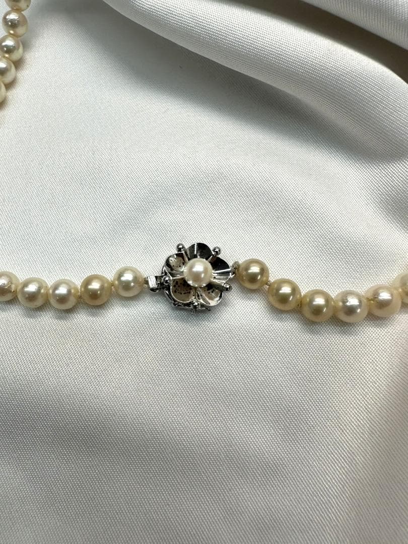 Akoya genuine pearl necklace with 6.2mm pearls and silver engraved clasp with safety feature