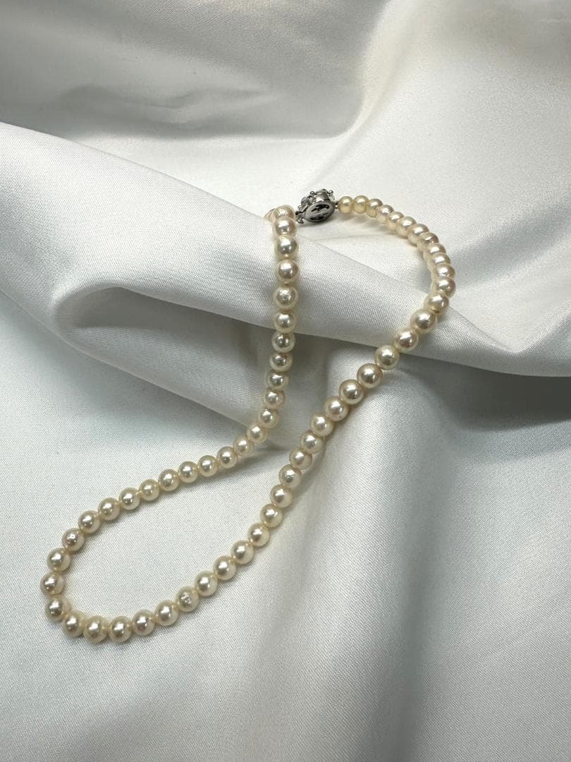 Akoya genuine pearl necklace with 6.2mm pearls and silver engraved clasp with safety feature