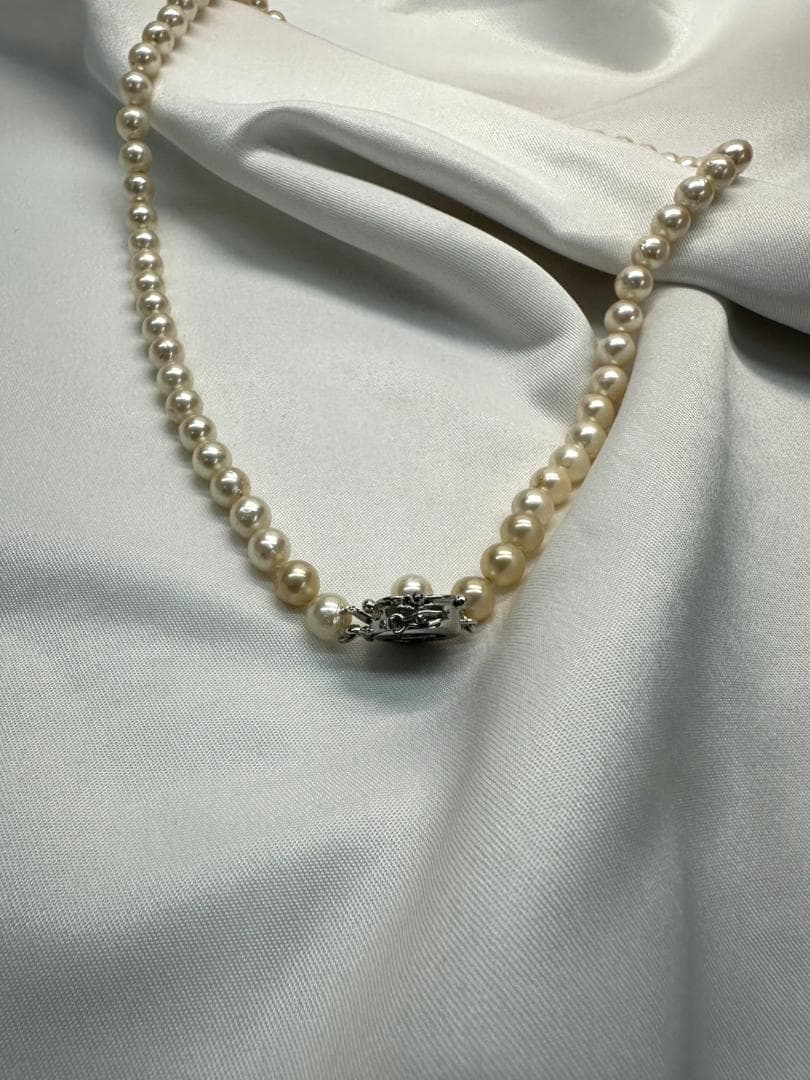 Akoya genuine pearl necklace with 6.2mm pearls and silver engraved clasp with safety feature