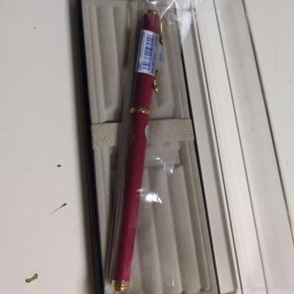 Red metal Pilot FCA-53R-RM fountain pen with included case on white background