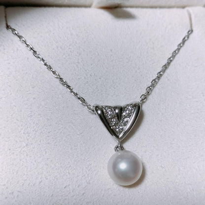 Mikimoto diamond and Akoya pearl necklace in 18K white gold with 7.8mm pearls and clasp markings