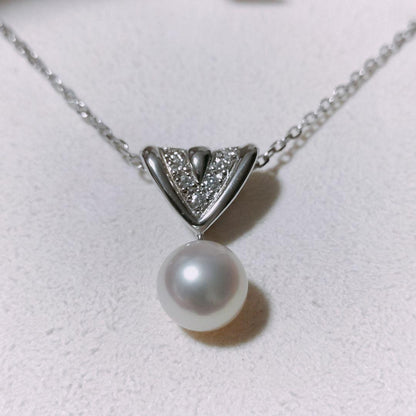 Mikimoto diamond and Akoya pearl necklace in 18K white gold with 7.8mm pearls and clasp markings
