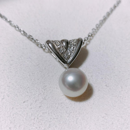 Mikimoto diamond and Akoya pearl necklace in 18K white gold with 7.8mm pearls and clasp markings