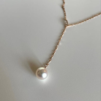 Mikimoto Akoya pearl necklace with 7.5mm pearl and small diamonds on 18K pink gold chain, 50cm length