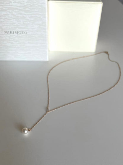 Mikimoto Akoya pearl necklace with 7.5mm pearl and small diamonds on 18K pink gold chain, 50cm length