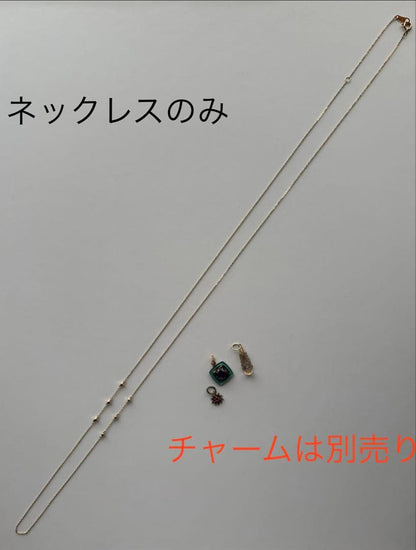 Agate square-beaded gold necklace approximately 75cm long with adjustable chain and guarantee certificate