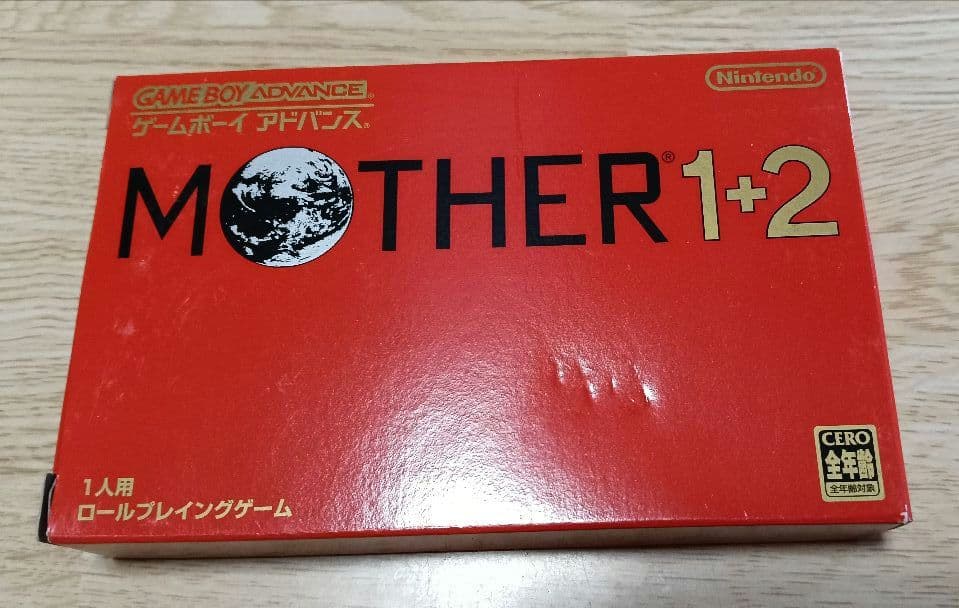MOTHER3 and MOTHER1+2 game cartridges set with visible scratch on one cartridge