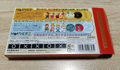 MOTHER3 and MOTHER1+2 game cartridges set with visible scratch on one cartridge