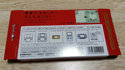 MOTHER3 and MOTHER1+2 game cartridges set with visible scratch on one cartridge