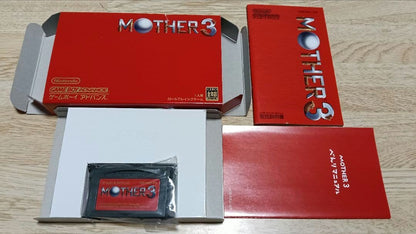 MOTHER3 and MOTHER1+2 game cartridges set with visible scratch on one cartridge