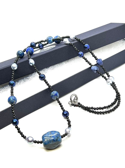 Akoya pearl necklace with large gray lapis lazuli beads on a black tourmaline chain, 80cm length
