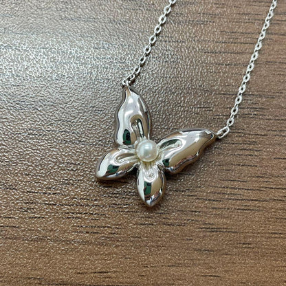 Mikimoto Pearl Butterfly necklace featuring a delicate chain and butterfly pendant with pearl accents