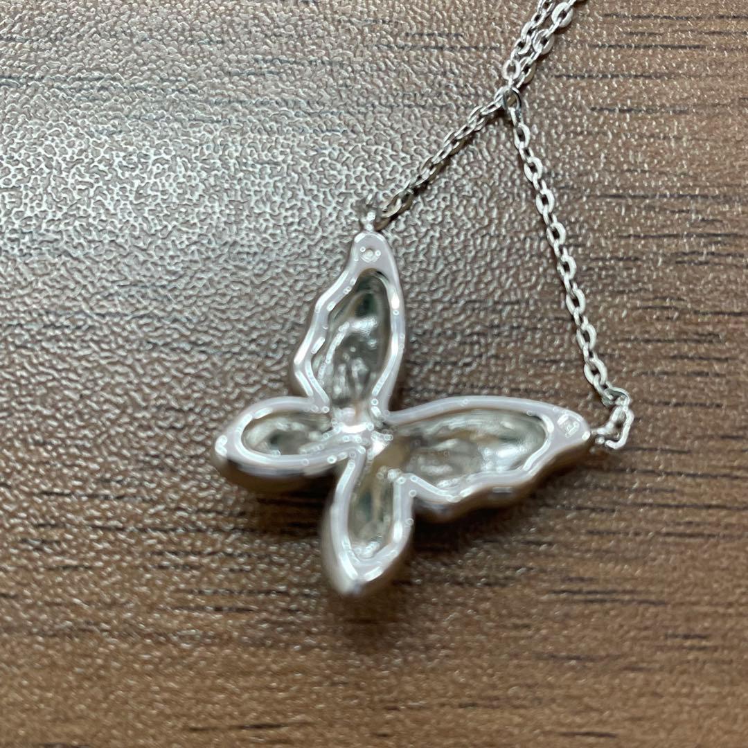 Mikimoto Pearl Butterfly necklace featuring a delicate chain and butterfly pendant with pearl accents