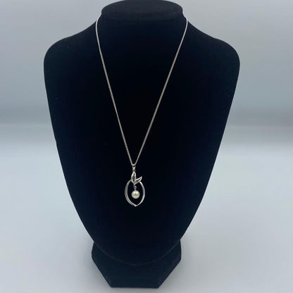 Mikimoto pearl pendant necklace featuring a 6.5mm pearl with 2x3cm pendant on a 39cm chain