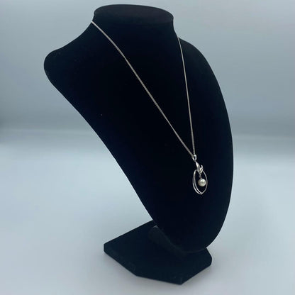Mikimoto pearl pendant necklace featuring a 6.5mm pearl with 2x3cm pendant on a 39cm chain