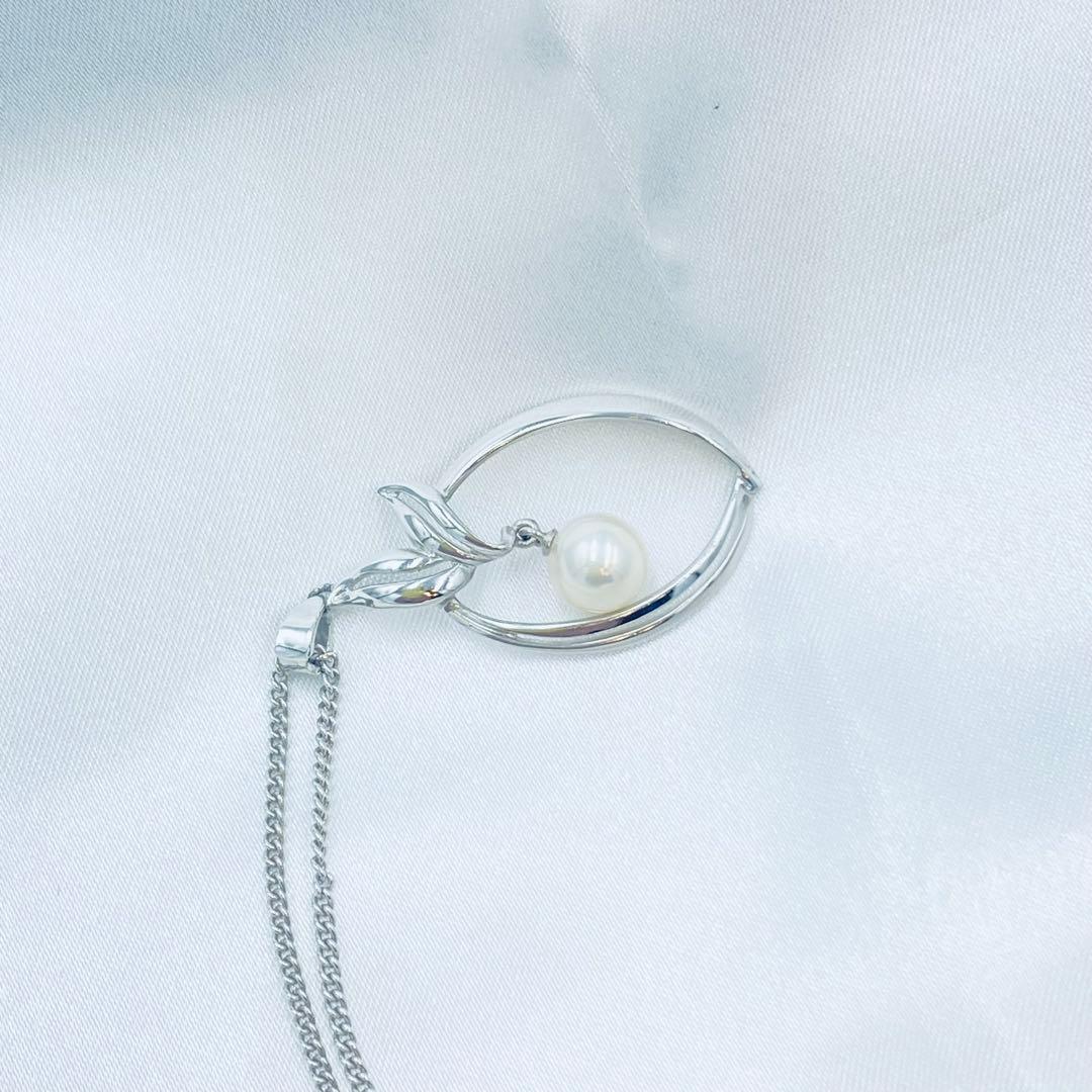 Mikimoto pearl pendant necklace featuring a 6.5mm pearl with 2x3cm pendant on a 39cm chain