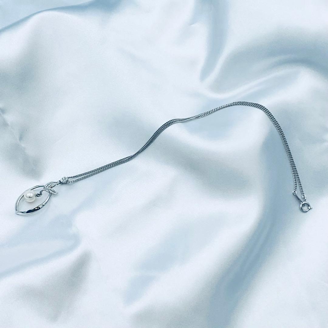 Mikimoto pearl pendant necklace featuring a 6.5mm pearl with 2x3cm pendant on a 39cm chain