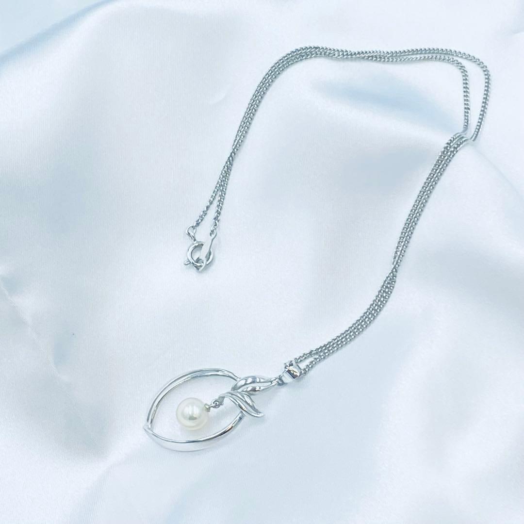 Mikimoto pearl pendant necklace featuring a 6.5mm pearl with 2x3cm pendant on a 39cm chain