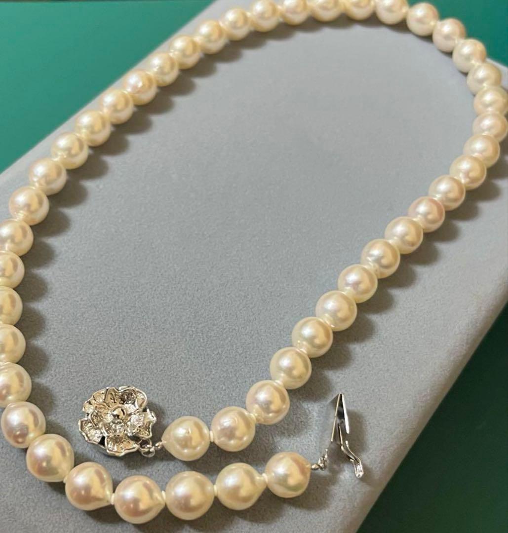 Takashimaya Akoya pearl necklace and earrings set featuring 8-8.5mm slightly pinkish and white pearls with silver clasp