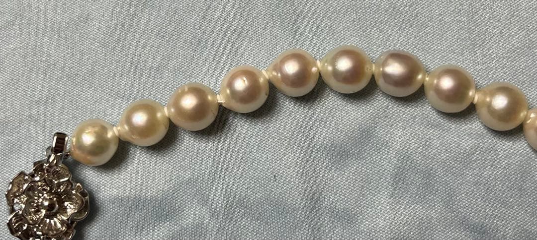 Takashimaya Akoya pearl necklace and earrings set featuring 8-8.5mm slightly pinkish and white pearls with silver clasp