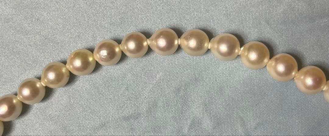 Takashimaya Akoya pearl necklace and earrings set featuring 8-8.5mm slightly pinkish and white pearls with silver clasp