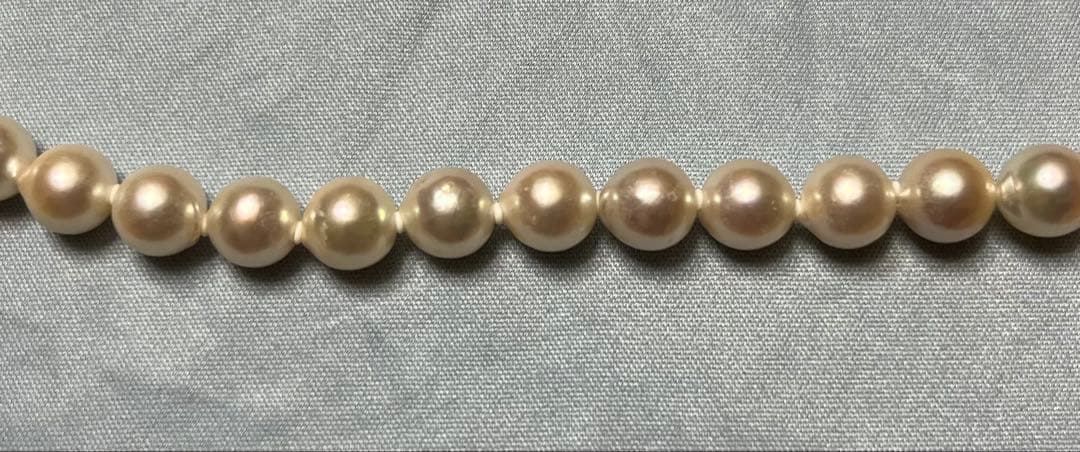 Takashimaya Akoya pearl necklace and earrings set featuring 8-8.5mm slightly pinkish and white pearls with silver clasp