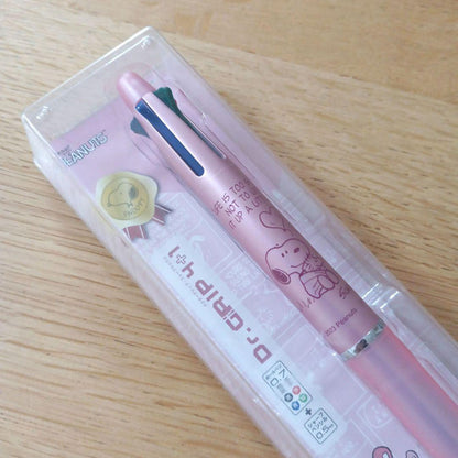 Pilot Snoopy Dr. Grip 4+1 multi-function pen in pink with Snoopy and Woodstock design