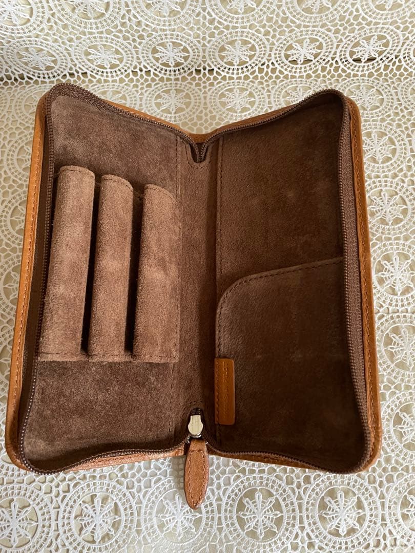 PILOT Pen Specialized Round Zipper Pen Case in brown with two pockets and pig suede interior