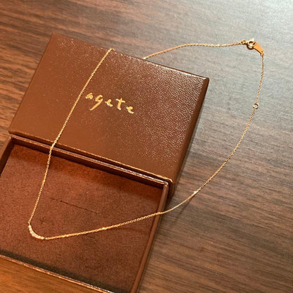 agete K10 yellow gold crescent moon necklace with 0.05ct diamonds on 40cm chain