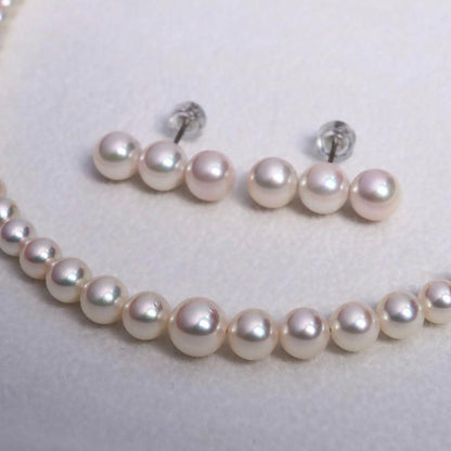 Akoya pearl necklace and earring set with pink round pearls on titanium, necklace 42 cm long