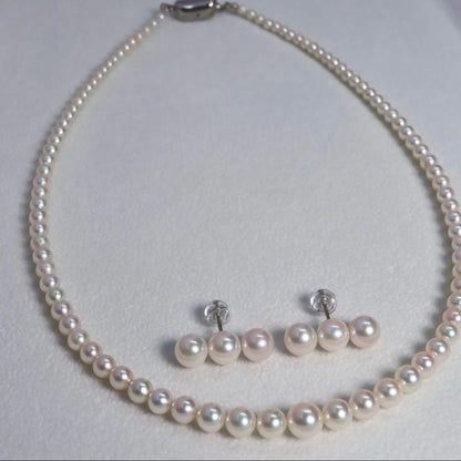 Akoya pearl necklace and earring set with pink round pearls on titanium, necklace 42 cm long