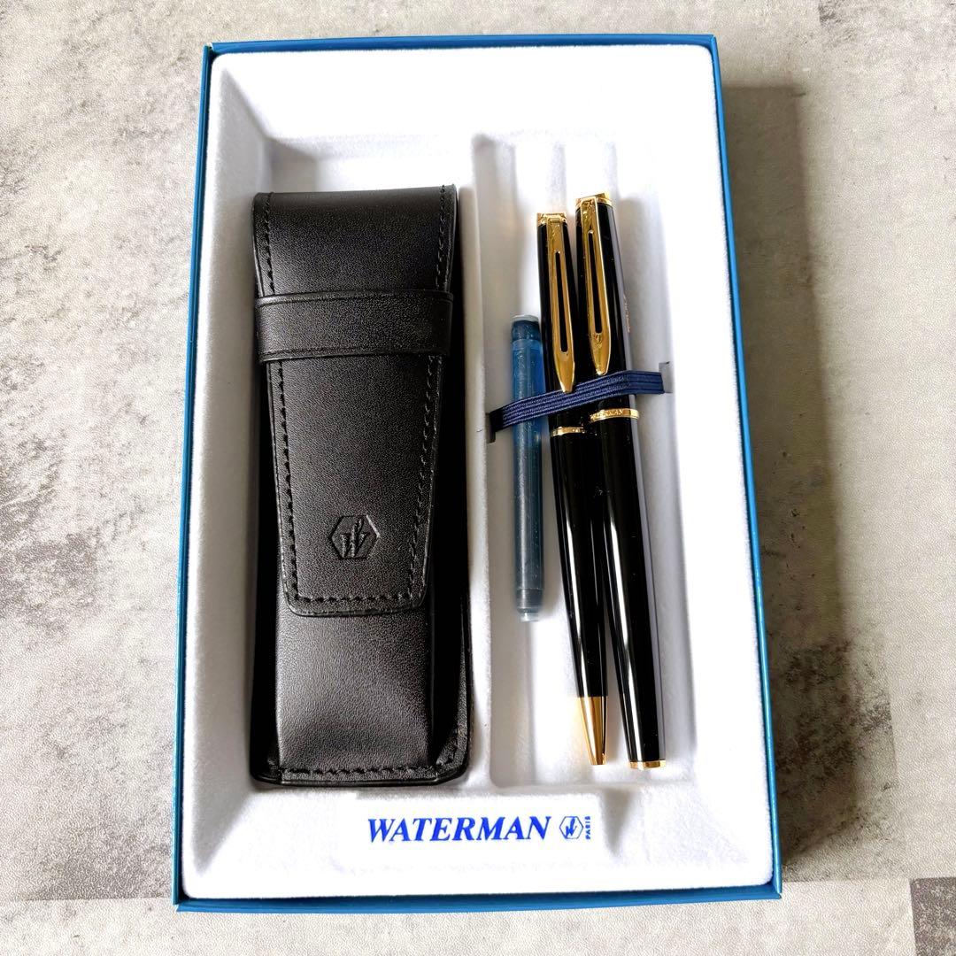 Waterman fountain pen and ballpoint pen set with leather case, displayed in original packaging with slight box discoloration