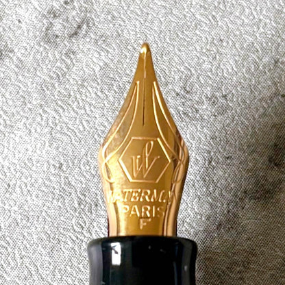 Waterman fountain pen and ballpoint pen set with leather case, displayed in original packaging with slight box discoloration