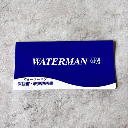 Waterman fountain pen and ballpoint pen set with leather case, displayed in original packaging with slight box discoloration