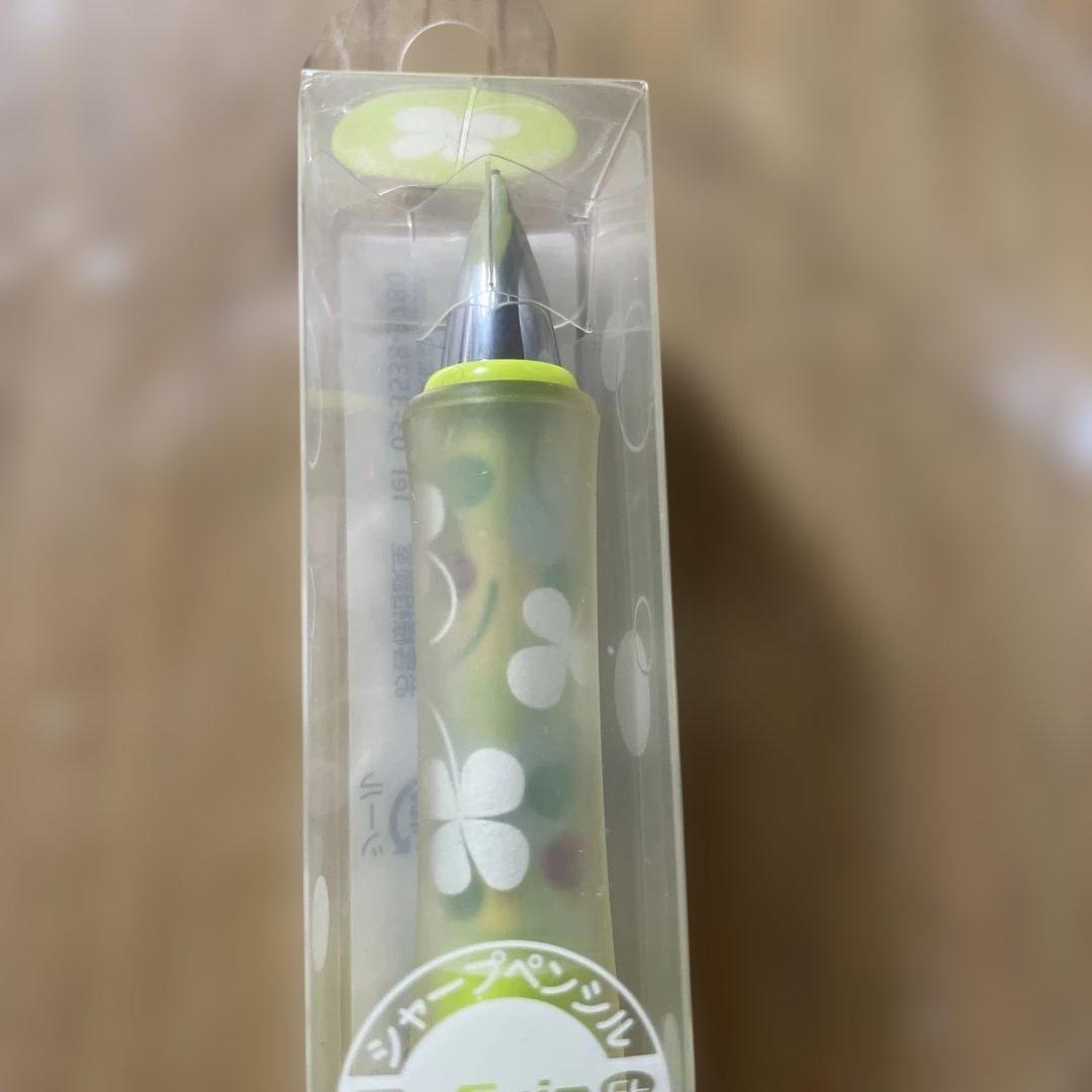 Pilot Dr.grip Tentenmushi pen with worn finish and deformed box on white background