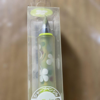 Pilot Dr.grip Tentenmushi pen with worn finish and deformed box on white background