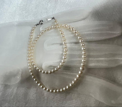 Pure Pearl Baby Pearl Necklace 4mm size in white freshwater or Akoya pearls with silver 925 clasp and 38cm length