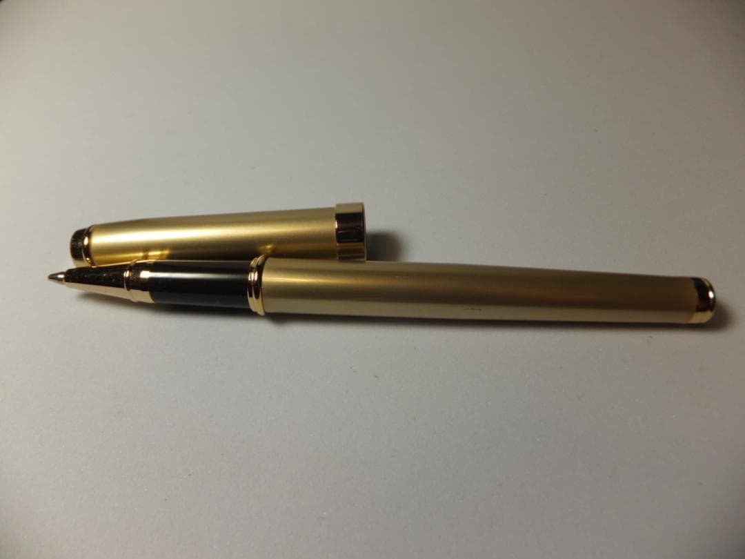 Used PILOT DRIVE ballpoint pen in navy color shown from side view