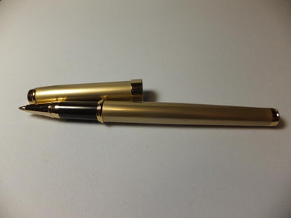 Used PILOT DRIVE ballpoint pen in navy color shown from side view