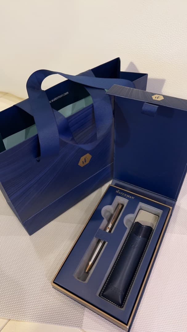 Waterman Metropolitan Essential Metal GT ballpoint pen with twist mechanism and metal finish shown with leather case and box