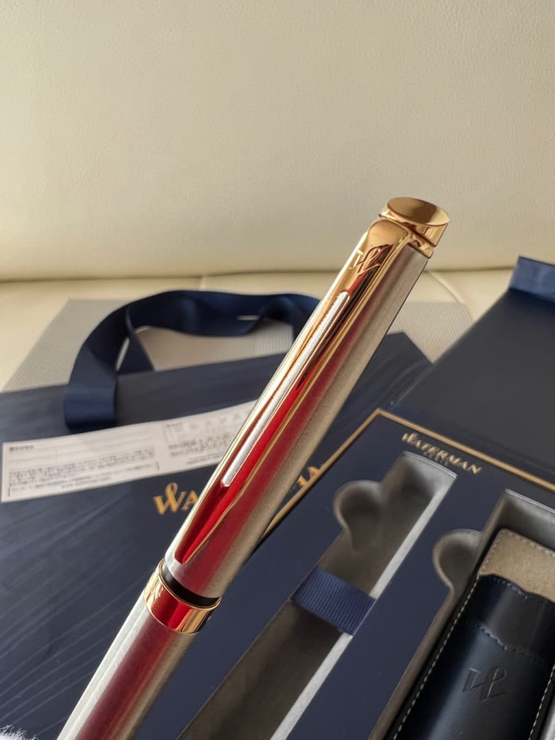 Waterman Metropolitan Essential Metal GT ballpoint pen with twist mechanism and metal finish shown with leather case and box